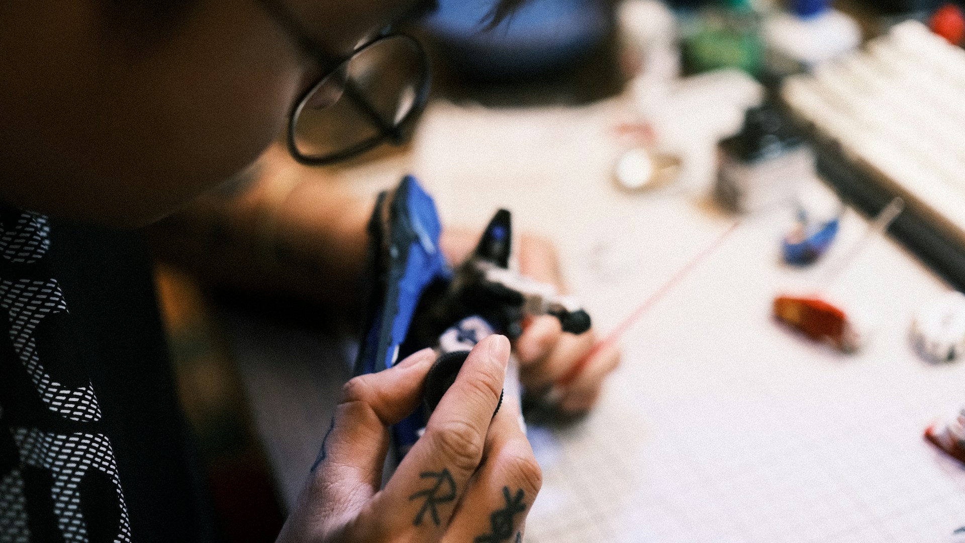 a man is working on a piece of art