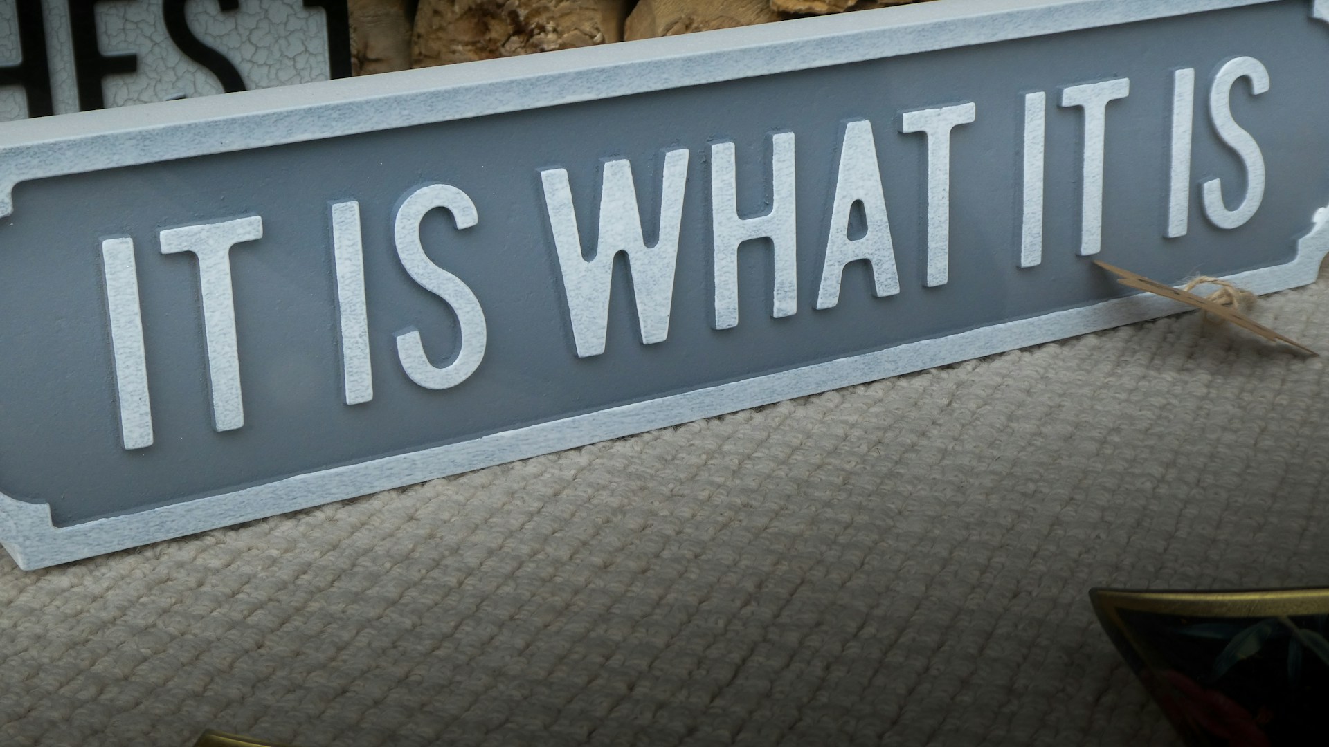 white and black wooden signage