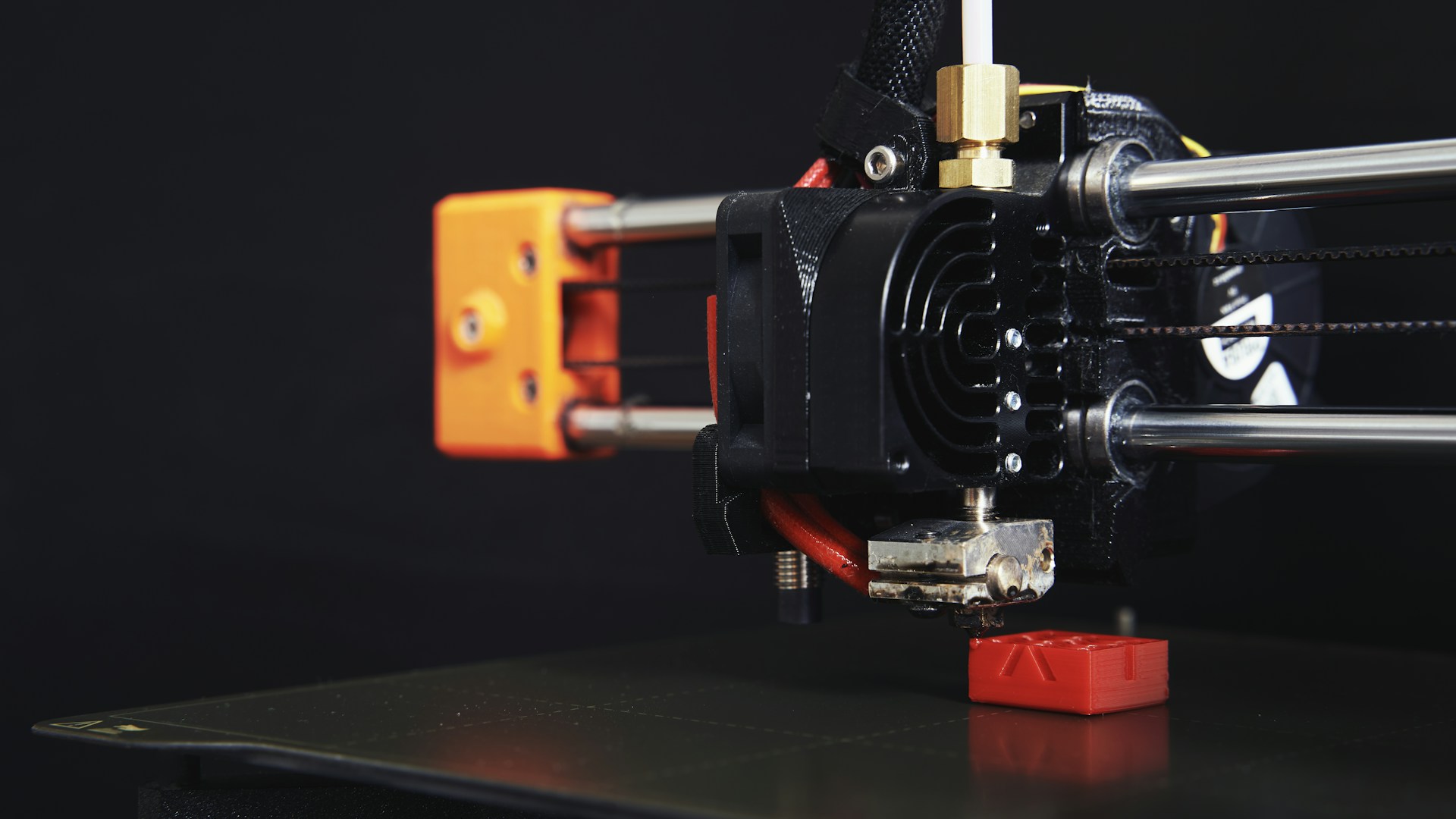 a close up of a machine with a black background