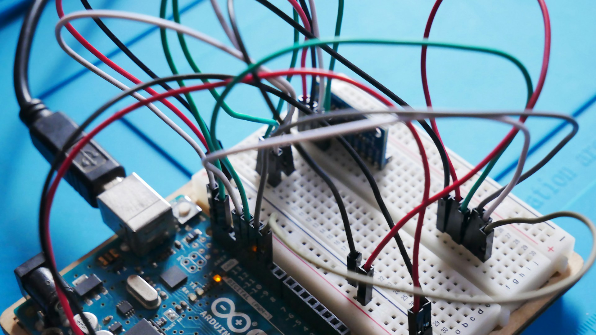 a close up of a board with wires attached to it
