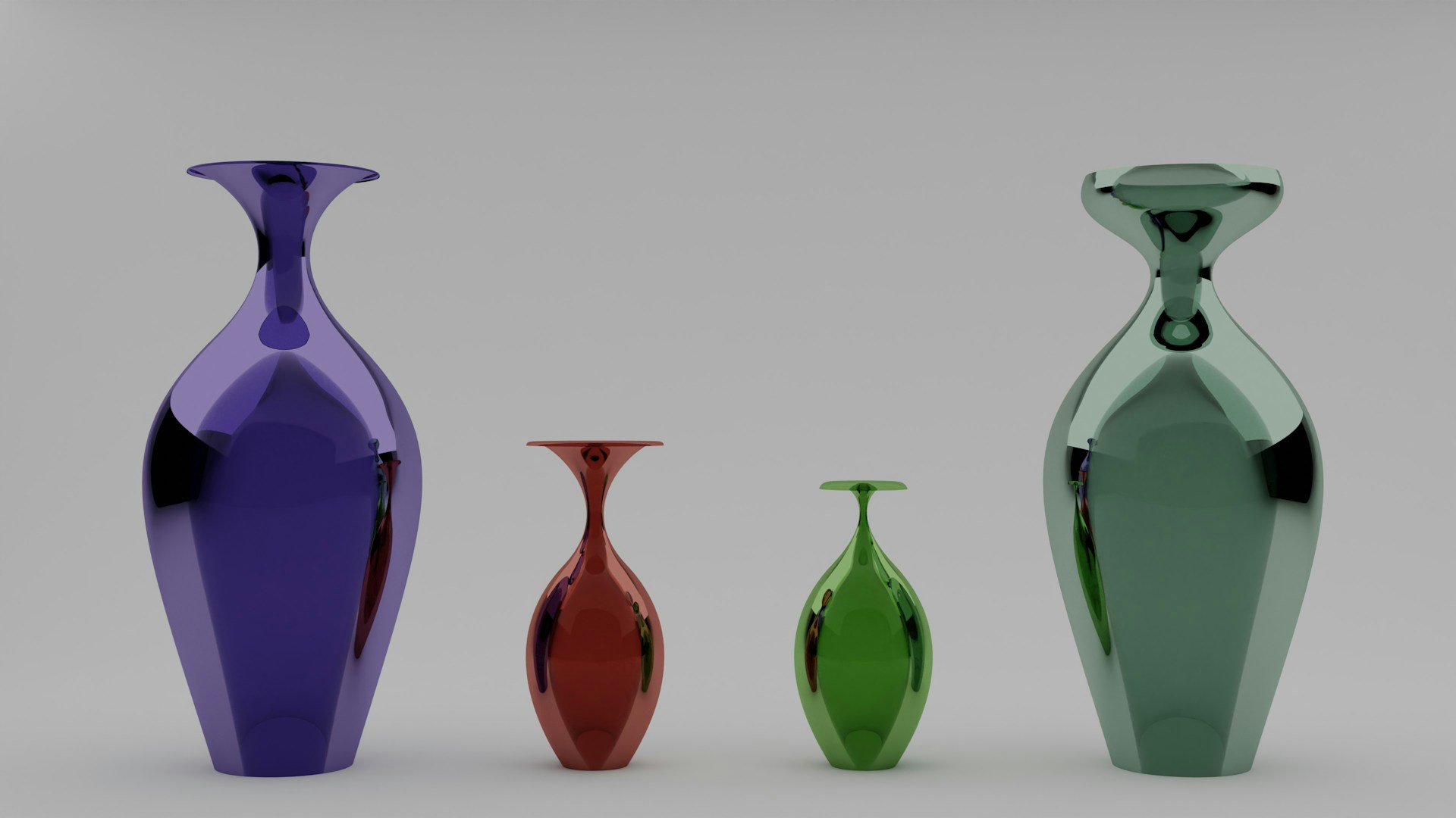 a group of three vases sitting next to each other