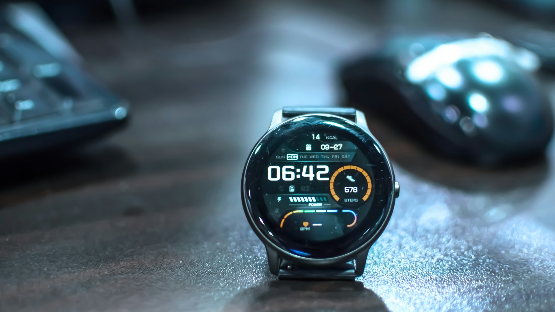 a close up of a smart watch on a table